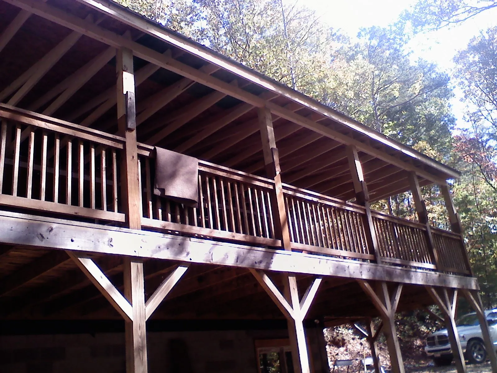 Timber framing under a new elevated porch and deck — Roof Leak Repair in Idaho Springs by Roofing Brothers